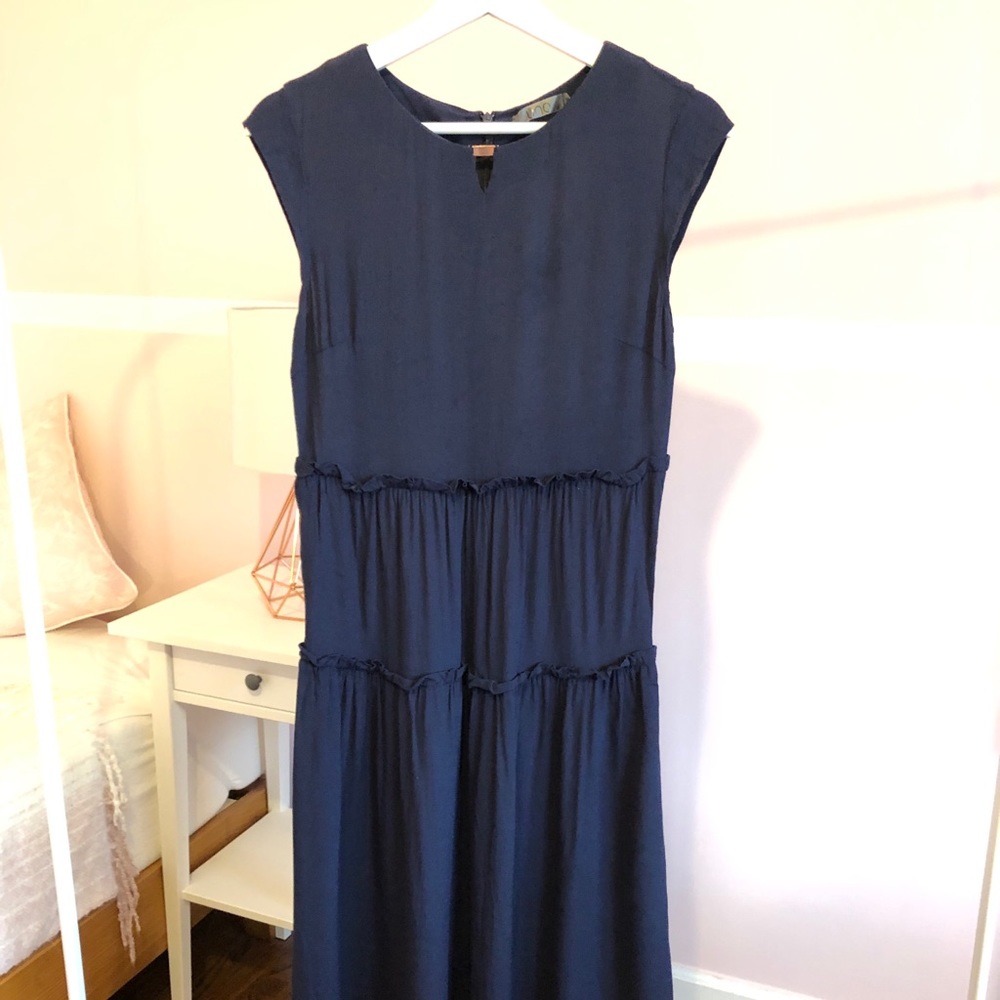 Darkblue dress with ruffle hem